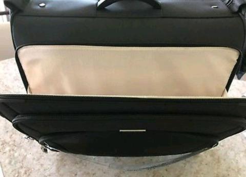 Samsonite travel bag with tags. Unwanted gift