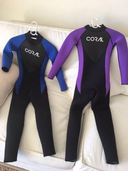 Two kiddies wet suits for sale
