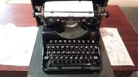Vintage black Filla portable typewriter