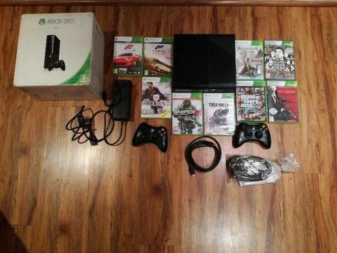 Xbox 360E 9 games and 2 controls