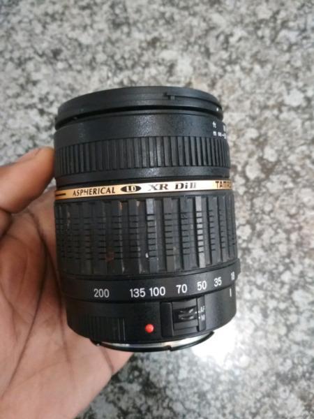 Camera Lens Tamron 18-200mm works 100% Fits on a Canon Camera still in a good working condition