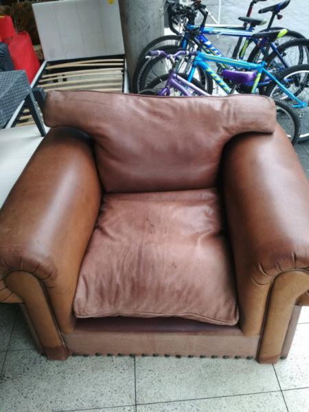 Brown single Original Leather Couch still in a good condition