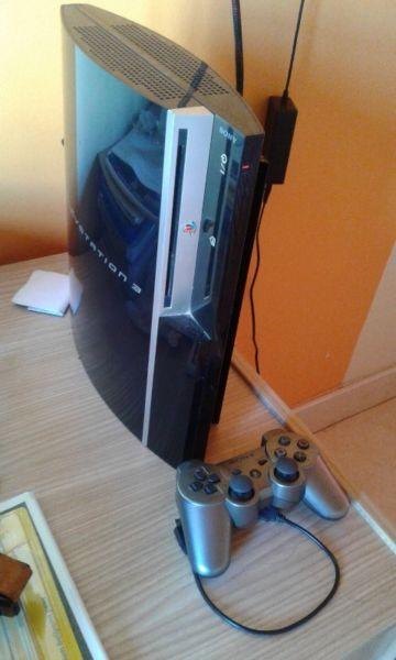 Playstation 3 with 15 games and control R2200 Negotiable