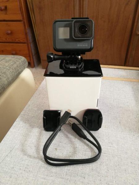 GoPro Hero 5 Black Edition with 2 batteries and adhesive mounts