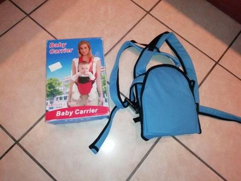Brand new baby carrier with box