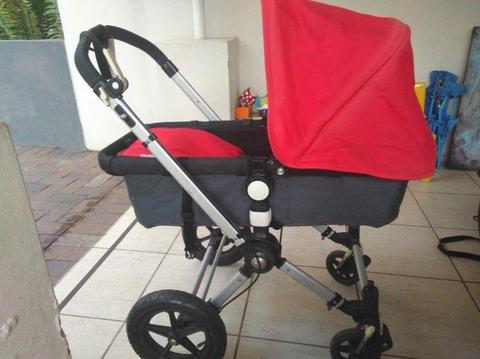Bugaboo Chameleon stroller with newborn bassinet and Maxi Cosi car seat