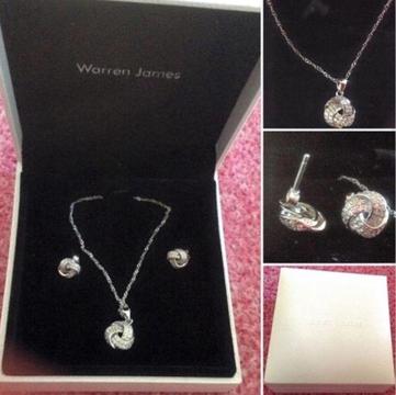 Brand new pendant and earrings