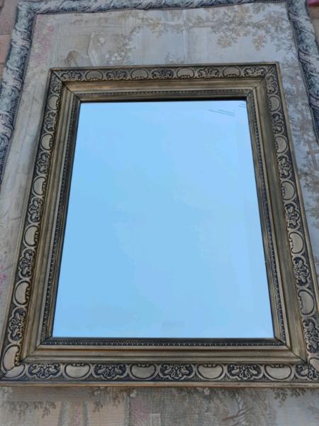 Bevelled mirror in beautiful frame
