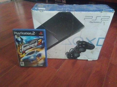 playstation 2 console with 2 controllers, 1game and a 8mb memory card