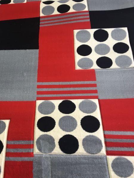 Black/grey and red rug