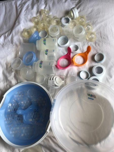Baby bottles, steriliser and bath mat
