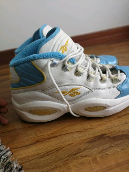 Pair of Reebok Iverson basketball shoes