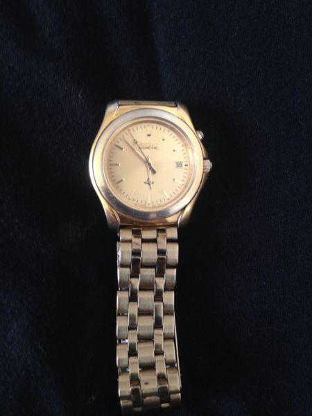 Gold Seiko kinetic watch