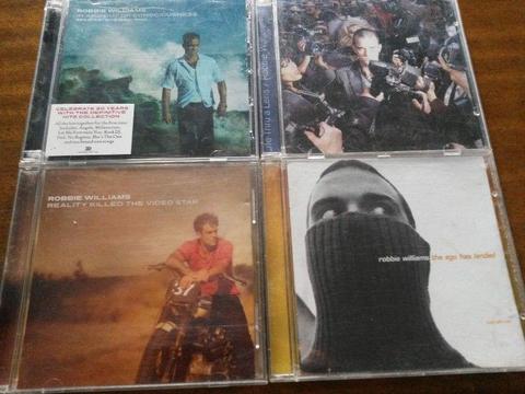 4 Robbie Williams CDs R350 negotiable for all four