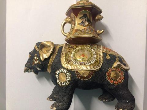 Antique elephant figurine (damaged)