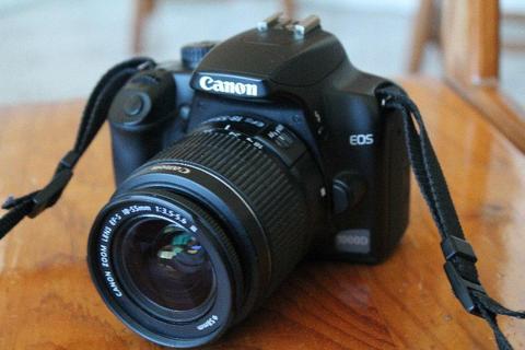 Canon 1000D with 4gb SD card, charger and bag