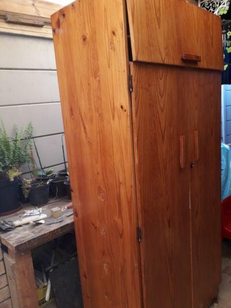 Solid pine wood Cupboard. 4 large shelves, hanging space and packing space for larger items on