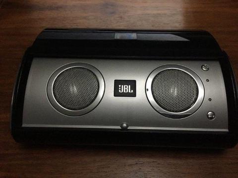 JBL Portable Travel Speaker. Works with auxuliary only. AA Battery operated. Flat for traveling