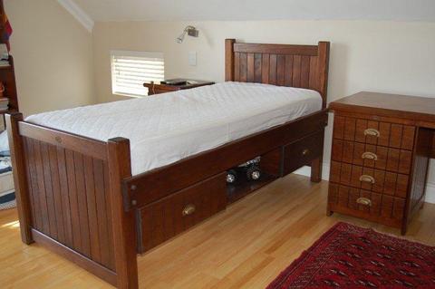 Captain's bed, pull-out bed, desk and bedside cabinet for boy's bedroom