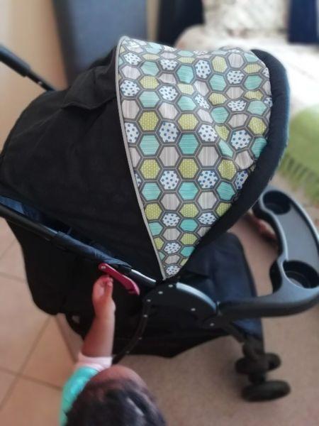 Baby stroller with a car seat