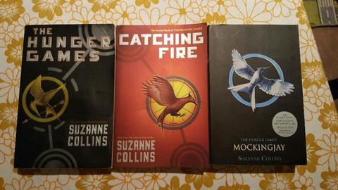 The hunger games trilogy by Suzanne Collins