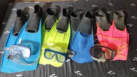 Flippers x 4 pairs and diving goggles x 3