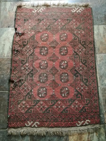 Damaged oriental rug