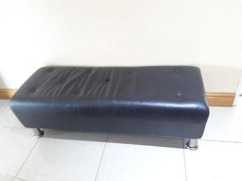 Black genuine leather Ottoman in good condition R1500 contact 082 8090 530
