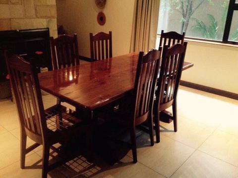 Solid Rhodesian Teak dinning room table and chairs for sale