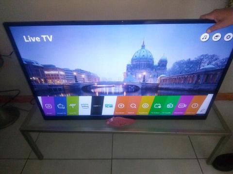 As new lg 43 inch uhd smart tv web os 4k with ellies wallmount new in box