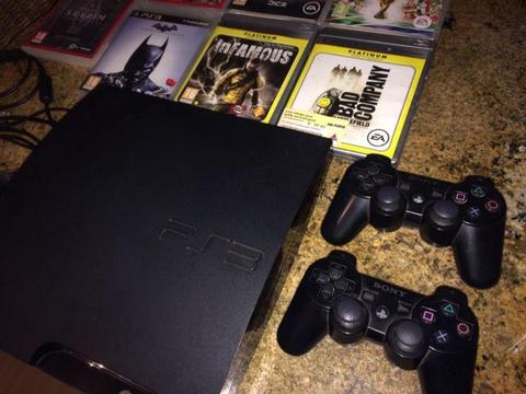 Playstation 3, in excellent condition, with x2 controllers , and x7 games