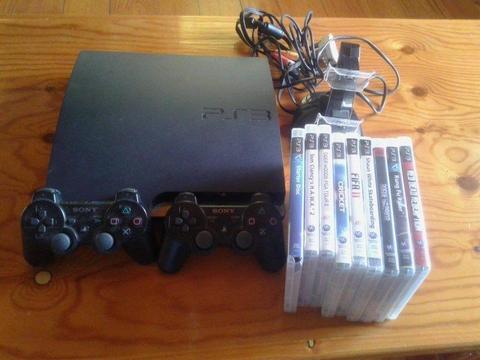 PS3 WITH 2 CONTROLS AND GAMES