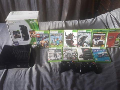 Xbox 360 with 10 Games and 2 controllers includes