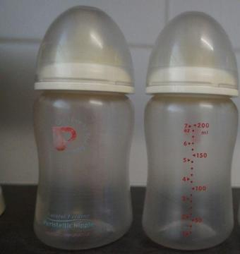 6 baby bottles and extras