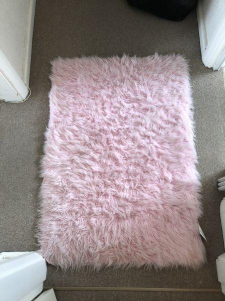 Pink fluffy mat