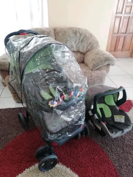 Chelino travel system with raincover