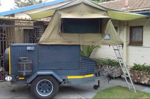 Off road trailer with roof top tent including freezer, TV, etc
