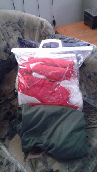 Santa suit and big present bag to put gifts in