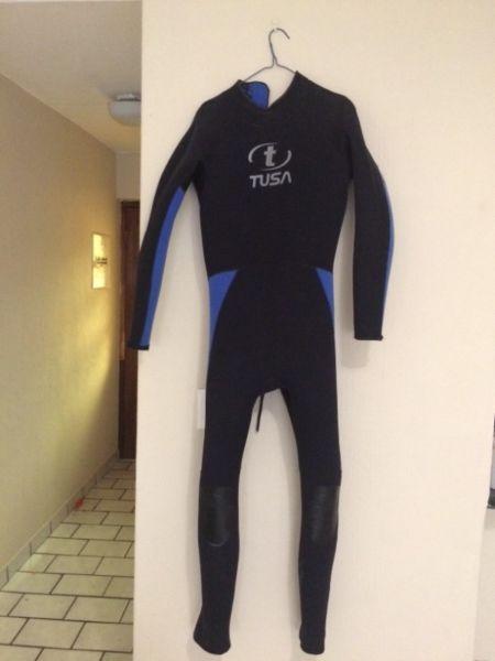 Two wetsuits for sale .Tusa