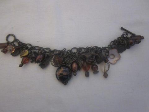 Bronze bracelet with variety of charms