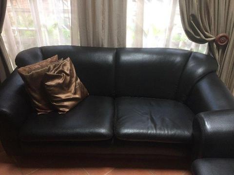 Black faux leather lounge suite