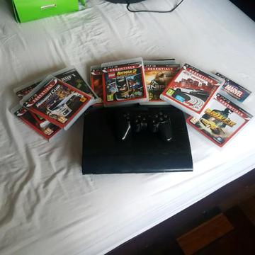 PS3 Console, Remote and 14 games for sale