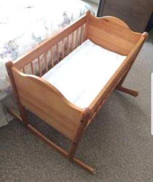 Imported from IKEA - beautiful wooden rocking baby crib for sale