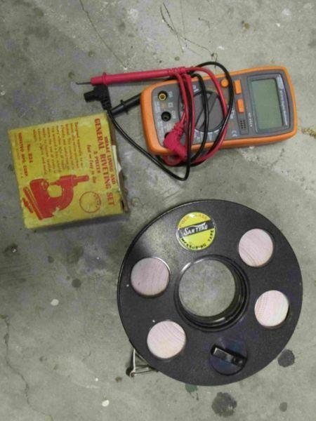 Measuring tape, rivet set, multimeter