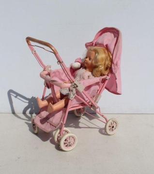 Vintage Pink Pram Stroller with Old Doll