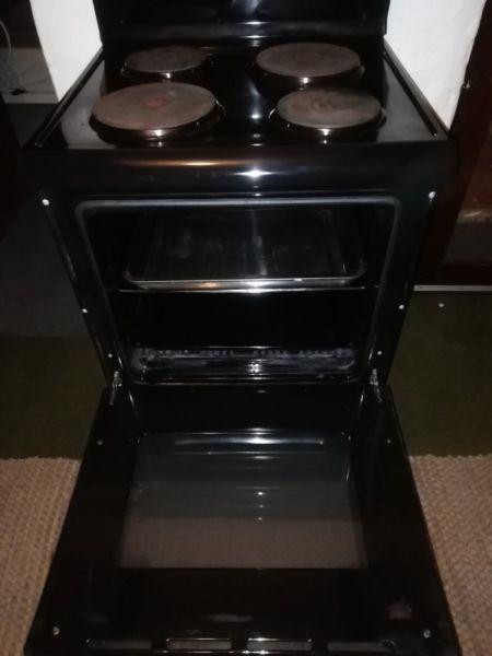 Defy Kitchen aire stove black 621 good condition all 4 plates and grill in perfect working order