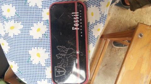 FOSSIL TINS R40 EACH