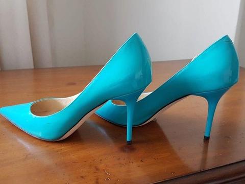 Designer shoes. Turquoise Jimmy Choo heels. Size 6. Used a few times. R3000