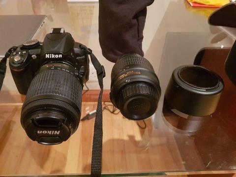 Nikon D3100, with additional lense and camera bag