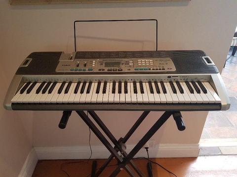 Casio Keyboard with lighting system and stand